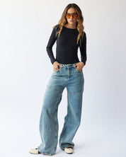 UNCOVERED JEANS