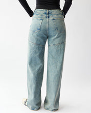UNCOVERED JEANS